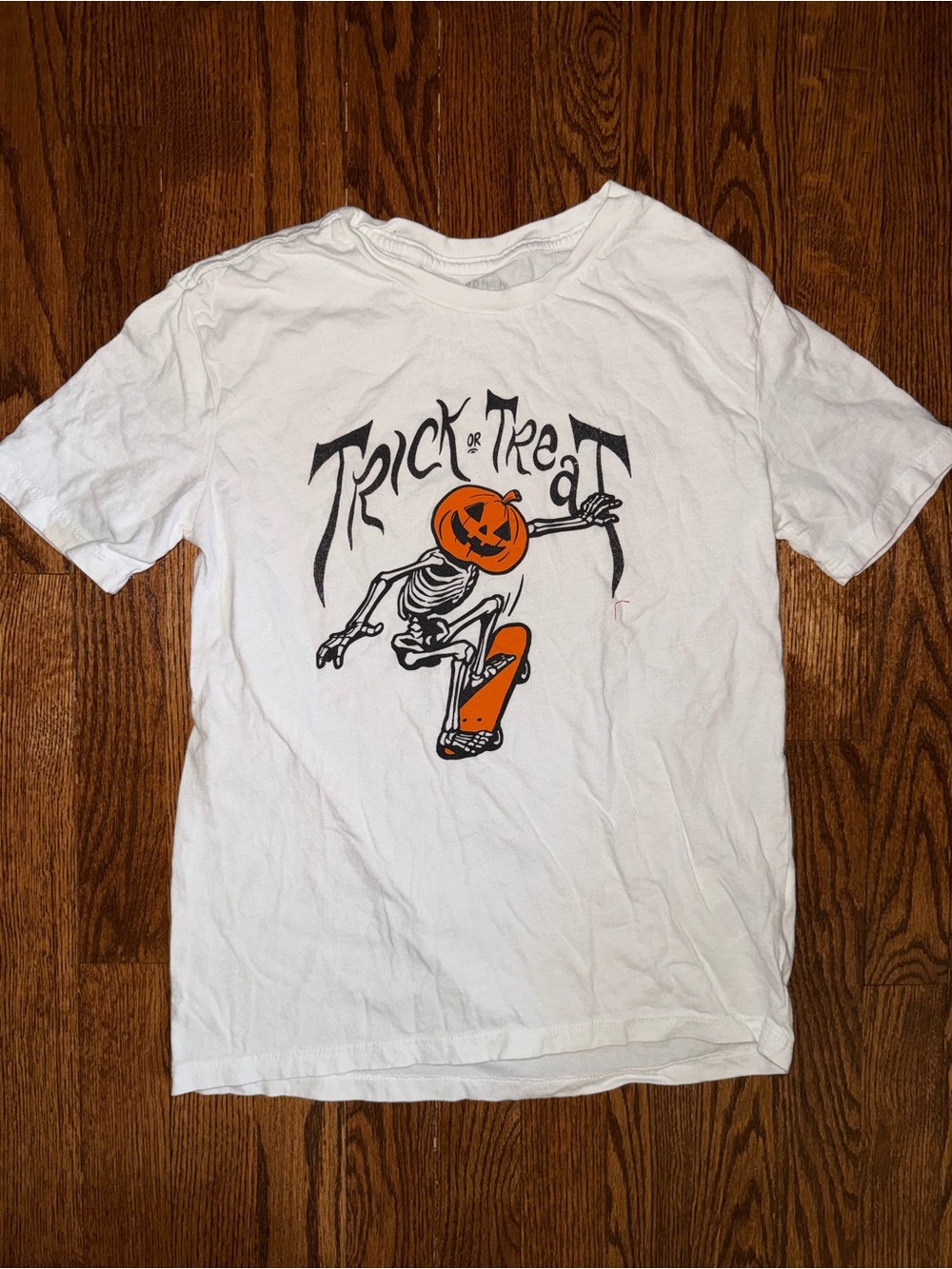 Old Navy White Graphic Tee with Orange Pumpkin Skate Skeleton